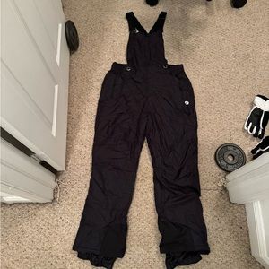 Women’s L snow bibs. Criss cross back